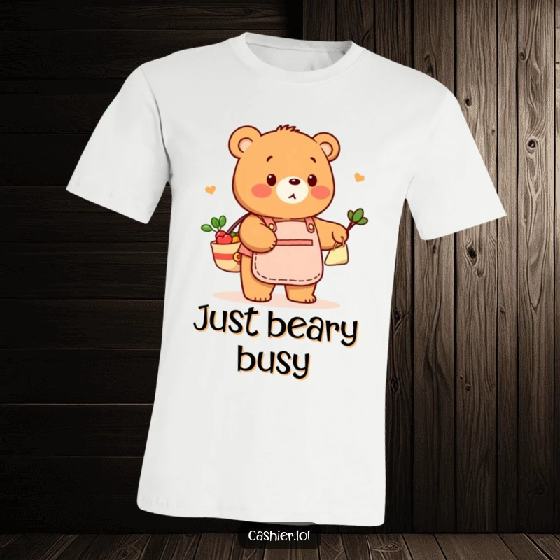 Funny T-shirt depicting a friendly bear in a store apron playfully bagging groceries, celebrating helpfulness and cheerful service.